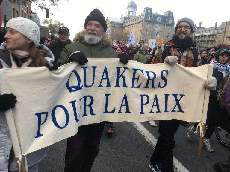 Holding banner Quakers for Peace